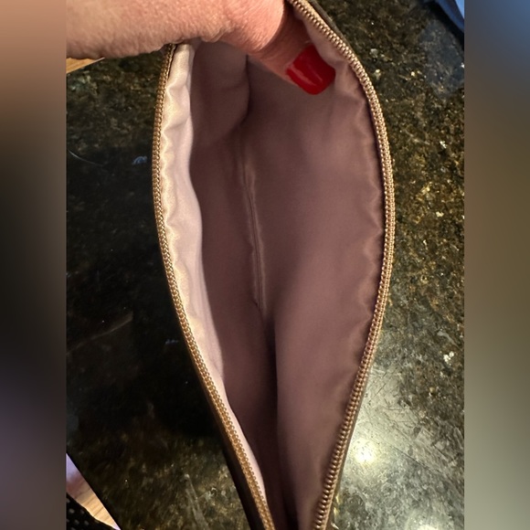 Coach tan wristlet with flower accent.  Timeless. EUC!! Smoke free home. - Picture 2 of 5